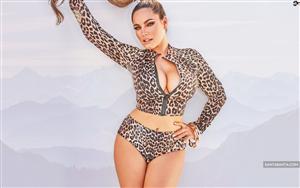 Kelly Brook rocks the animal print outfit while posing for a steamy photo-shoot